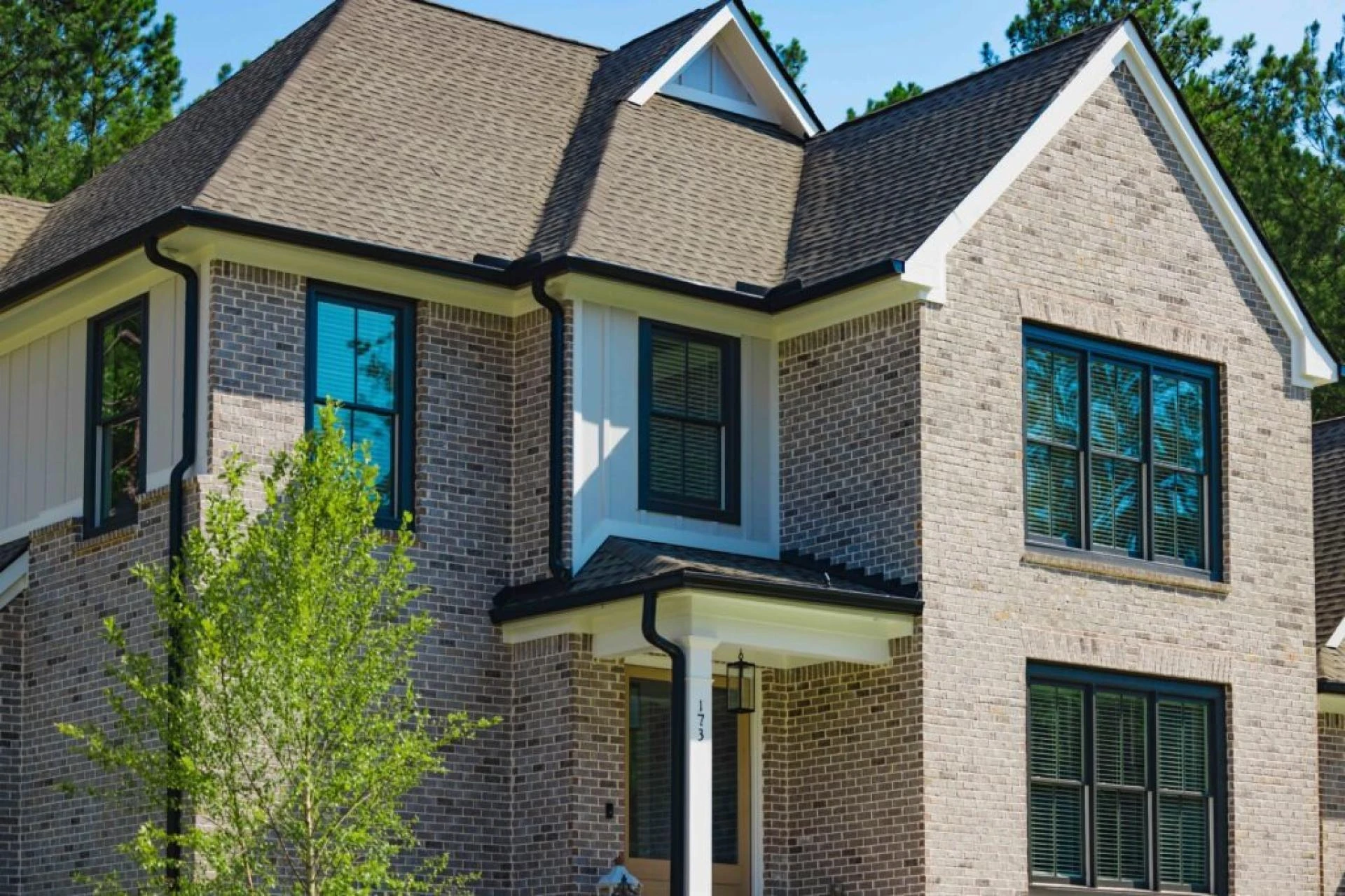 Comparing Asphalt Shingles, Metal, and Tile Roofing for Your Installation
