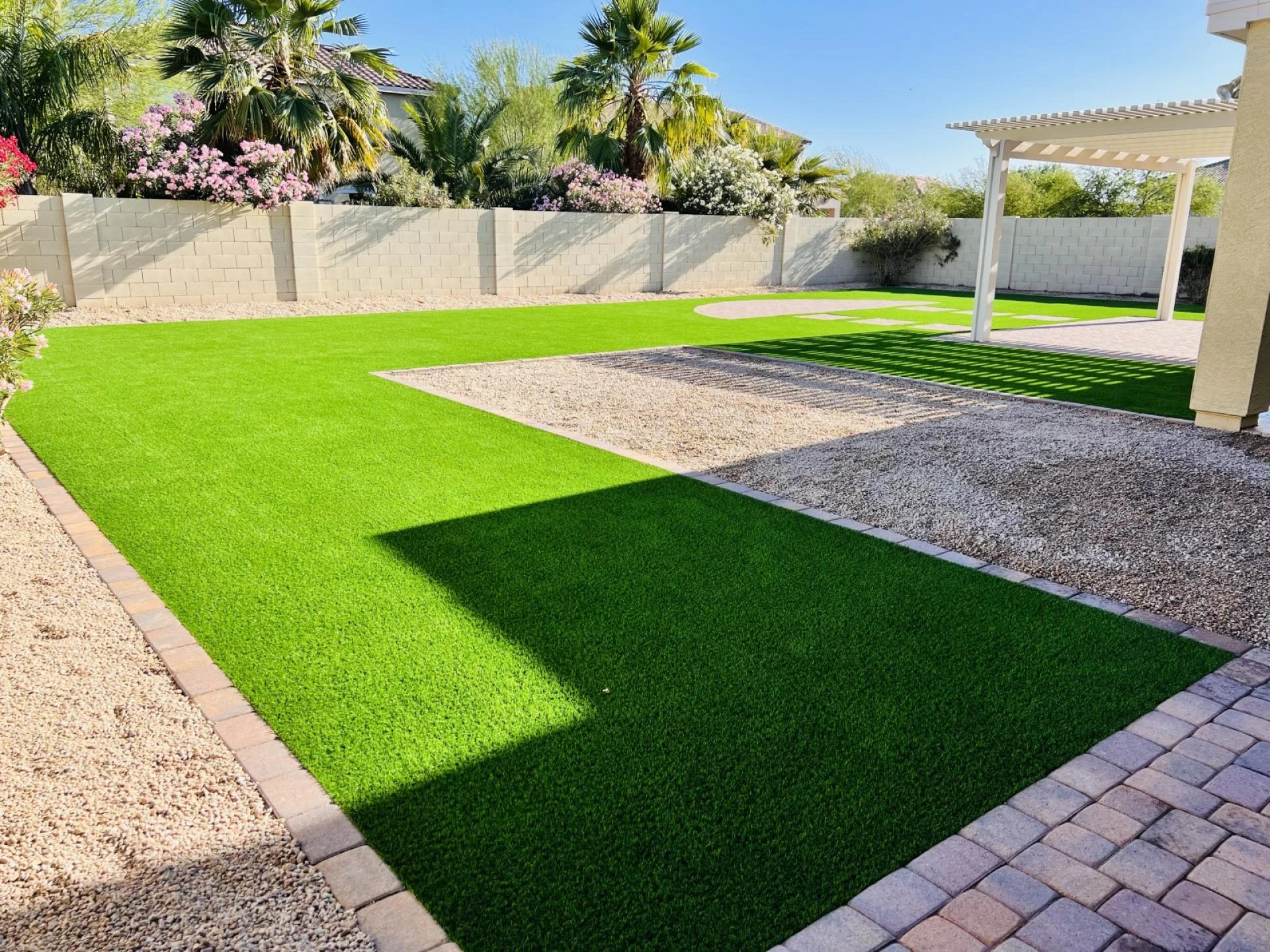 Synthetic Grass Maintenance Tips to Keep Your Turf Looking New