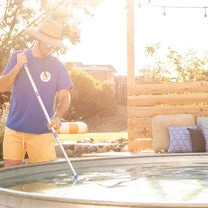 How a Blue Pool Vacuum Kit Keeps Backyard Pools Spotless